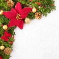 Christmas border with traditional decorations and poinsettia on t Royalty Free Stock Photo