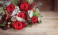 Christmas bouquet, romantic wedding bouquet with red roses. Royalty Free Stock Photo