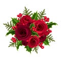 Christmas bouquet with roses and holly. Royalty Free Stock Photo