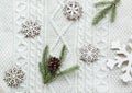 Christmas bouquet with spruce, fir-tree, snowflakes on white knitted background. Holiday card. Vintage style. F Royalty Free Stock Photo