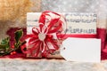 Christmas box (package) with blank gift tag Royalty Free Stock Photo