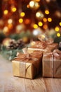Christmas boxes with gifts on Christmas bokeh background. Beautiful Christmas background. Happy New Year and Merry Christmas Royalty Free Stock Photo