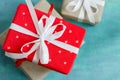 Christmas boxes of gifts festively decorated On a turquoise background Royalty Free Stock Photo