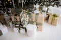 Christmas boxes with gifts under the tree Royalty Free Stock Photo