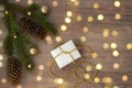 Christmas branches, pine cones, golden balls and a gift box. Christmas decor Royalty Free Stock Photo