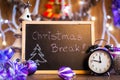 Christmas break written on the black chalkboard Royalty Free Stock Photo