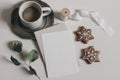 Christmas breakfast. Blank greeting card, invitation mockup. Star gingerbread cookies, cup of coffee. Vintage silver