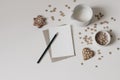 Christmas breakfast still life. Crispy honey oat or buckwheat heart shaped cereals isolated on white table background