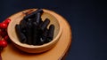 Christmas cake, close up photography, Wafer roll stick on a wooden bowl. Royalty Free Stock Photo