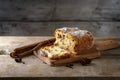 Christmas cake, in germany christstollen with cinnamon sticks an