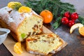 Christmas cake with nuts, dried fruit, tangerines.
