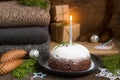 Christmas cake or pudding in festive decoration. Royalty Free Stock Photo