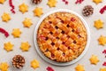 Christmas cake and cookies concept. Cake with cranberry jam and almonds. Royalty Free Stock Photo