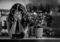 Frustrated woman waiting for a phone call in Christmas kitchen Royalty Free Stock Photo