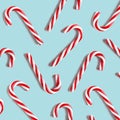 Christmas candies lie on blue background. Flat lay and top view Royalty Free Stock Photo