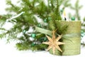 Christmas candle, decoration and green fir tree Royalty Free Stock Photo