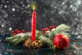 Christmas candle with fir branches