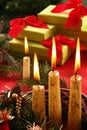 Christmas candle and gifts Royalty Free Stock Photo