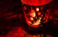 Christmas candle holders glowing red. Royalty Free Stock Photo