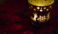 Christmas candle holders glowing red. Royalty Free Stock Photo