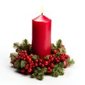 Christmas candle with holly berry decoration isolated on white background Royalty Free Stock Photo