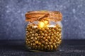 Christmas candle from a jar - how to make a beautiful candlestick with an electric candle made from scrap materials. DIY. Step by Royalty Free Stock Photo