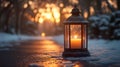 Christmas candle lantern in snow against blurred background. Selective focus and shallow depth of field Royalty Free Stock Photo