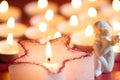 Christmas candle star and angel abstract background in night Royalty Free Stock Photo