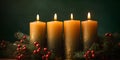 Christmas candles, Advent, with spruce branches and berries on green background Royalty Free Stock Photo