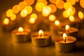 Christmas candles burning at night. Abstract candles background. Golden light of candle flame. Royalty Free Stock Photo