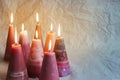 Christmas candles. Decoration on crumpled paper background Royalty Free Stock Photo