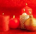 Christmas candles group on red glitter Royalty Free Stock Photo