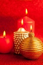 Christmas candles group on red glitter Royalty Free Stock Photo