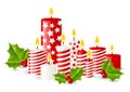 Christmas candles with holly berries Royalty Free Stock Photo