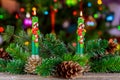 Christmas candles and ornaments over dark background with lights Royalty Free Stock Photo