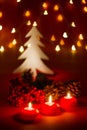 Christmas candles and ornaments over dark background with shaped Royalty Free Stock Photo