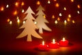 Christmas candles and ornaments over dark background with shaped Royalty Free Stock Photo