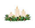 Christmas candles. Three white candles decorated with Christmas wreaths. Burning New Year candles. Christmas decorations Royalty Free Stock Photo