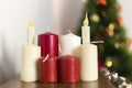 Christmas candles white and red Royalty Free Stock Photo