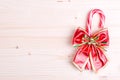 Christmas candy cane with bow on a blackboard bright colors Royalty Free Stock Photo