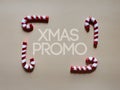 Christmas candy cane drums at studio above view over a brwon cream neutral background isolated Royalty Free Stock Photo