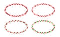 Christmas candy cane oval frame with red and green striped. Xmas border with striped candy lollipop pattern. Blank