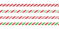 Christmas candy cane straight line border with red and green striped. Xmas seamless line with striped candy lollipop Royalty Free Stock Photo