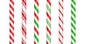 Christmas candy cane straight line border with red and green striped. Xmas seamless line with striped candy lollipop Royalty Free Stock Photo