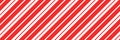 Christmas candy cane striped seamless pattern. Christmas candycane background with red stripes. Caramel diagonal print