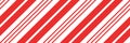 Christmas candy cane striped seamless pattern. Christmas candycane background with red stripes. Caramel diagonal print