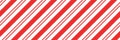 Christmas candy cane striped seamless pattern. Christmas candycane background with red stripes. Caramel diagonal print