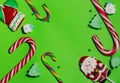 Christmas candy on a green background Royalty Free Stock Photo