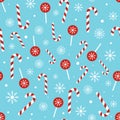 Christmas candy pattern on blue background. Seamless texture with Christmas candy cane, lollipop and snowflakes. Winter Royalty Free Stock Photo