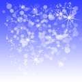 Christmas card  background. Winter Blue abstract background. Christmas holiday lights with snowflakes and stars Royalty Free Stock Photo